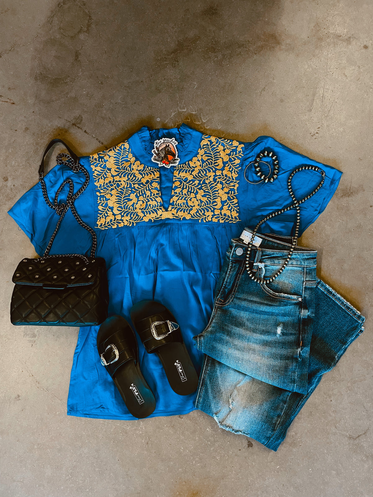 Blue and yellow embroidered top