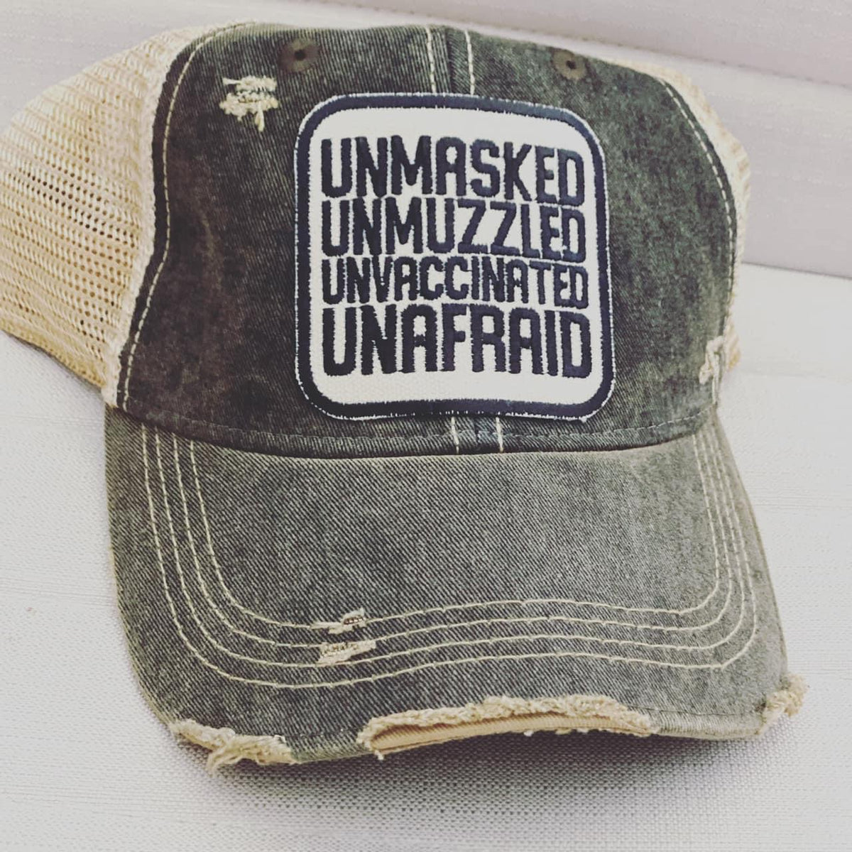 UNMASKED UNMUZZELED